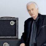 Jimmy Page posing next to the Sundragon Nymph