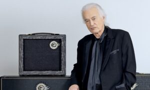 Jimmy Page posing next to the Sundragon Nymph