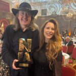 ‘Becoming Led Zeppelin’ director Bernard MacMahon (left) and producer Allison McGourty (right) at the UK’s National Film Awards in London on July 1, 2026. ‘Becoming Led Zeppelin’ won an award for best documentary / docu-series (Courtesy of Bernard MacMahon)